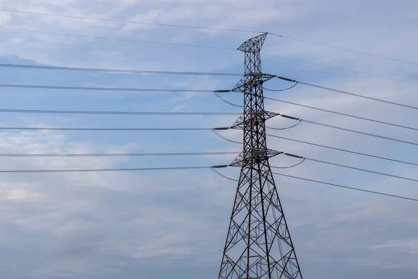 High voltage power tower. high-voltage power lines at sky background, high voltage electric transmission tower. high voltage electrical pole structure