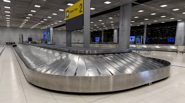 Baggage conveyor belt at the airport. Empty luggage claim line in airport