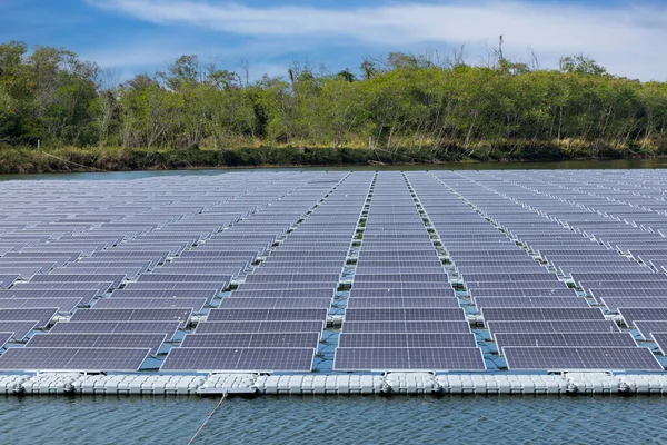 Solar power panels for green energy. Floating solar panels or solar cell Platform system on the lake. Floating solar panels or solar cell Platform on the water. Alternative renewable energy.