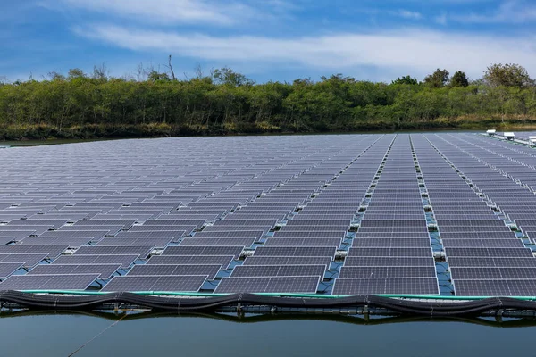 Solar power panels for green energy. Floating solar panels or solar cell Platform system on the lake. Floating solar panels or solar cell Platform on the water. Alternative renewable energy.