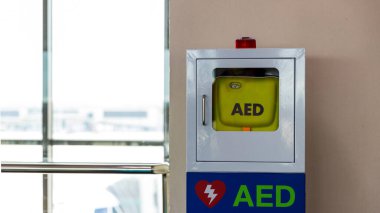 First aid box cardiopulmonary resuscitation using automated external defibrillator device, AED. First aid box for safety reason at Airport.