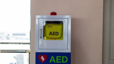 First aid box cardiopulmonary resuscitation using automated external defibrillator device, AED. First aid box for safety reason at Airport.