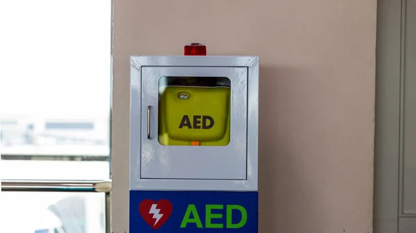First aid box cardiopulmonary resuscitation using automated external defibrillator device, AED. First aid box for safety reason at Airport.