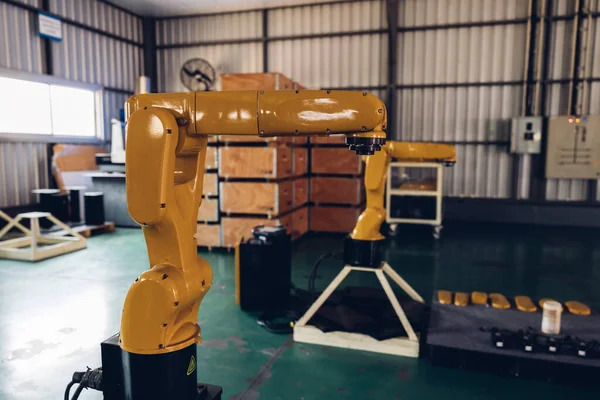 Spare Part New Generation Robotic Arm for assembly work on the production line. Spare Part Robot arm at the factory. Industrial automation technology.