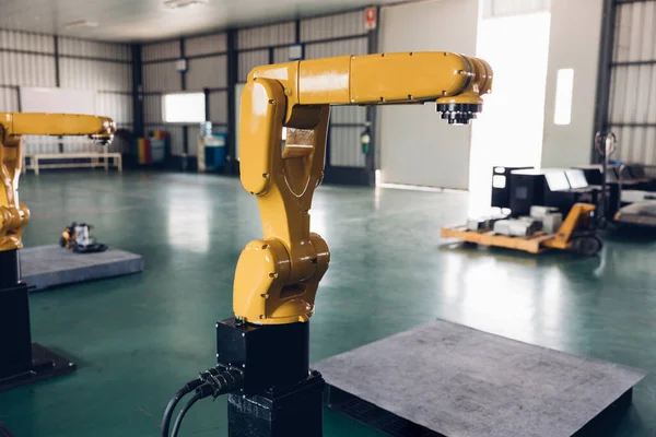 Spare Part New Generation Robotic Arm for assembly work on the production line. Spare Part Robot arm at the factory. Industrial automation technology.