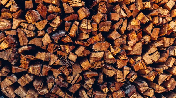 stock image Pile of wood logs storage for industry. Wall of stacked wood logs as background. a pile of natural wooden logs background.