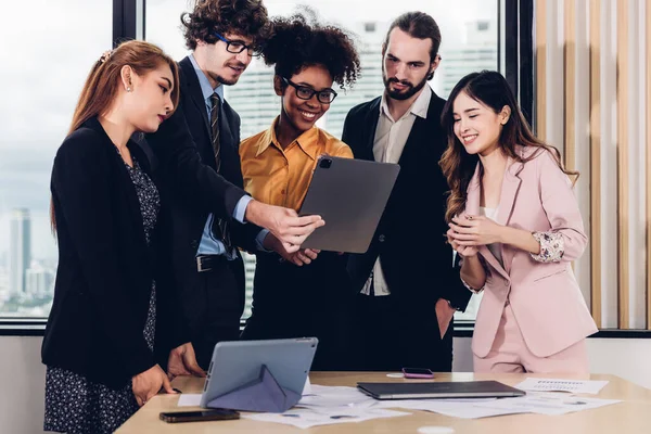 stock image Diverse colleagues gather in brainstorm discuss statistics together. Group of people colleagues gather doing Brainstorming business plan together. Team Brainstorm Working Concept. people meeting 