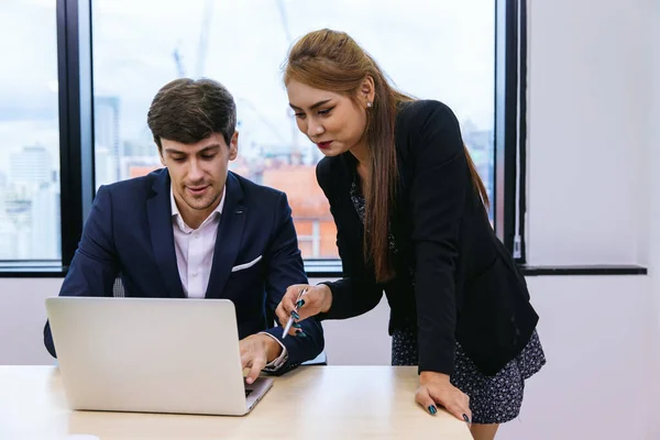 stock image Businessman leader in marketing coaching interested business people, giving educational workshop presentation in modern office.