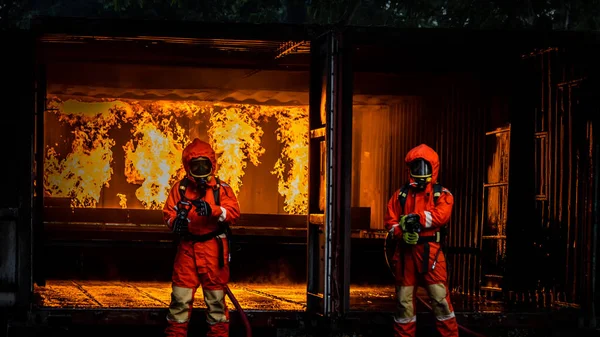Firefighter Concept Fireman Using Water Extinguisher Fighting Fire Flame Firefighters — Stockfoto