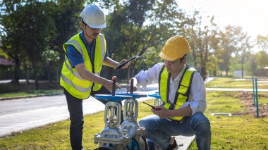 Industrial engineer work on site. engineer visit and inspection site engineer at industrial site. Inspector engineer check and working on site