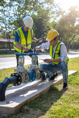 Industrial engineer work on site. engineer visit and inspection site engineer at industrial site. Inspector engineer check and working on site