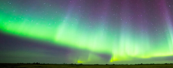 Northern Lights Aurora. Aurora borealis. A wonderful night with northern lights in iceland. Icelandic spiral northern lights.	