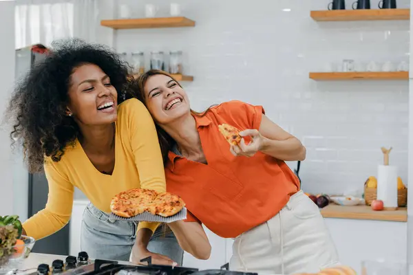 stock image Pride LGBT Family at the kitchen Happy face. Preparing family dinner at home. Happy smiling family having fun cooking at kitchen together. Family lifestyle. Happy together cooking on kitchen.