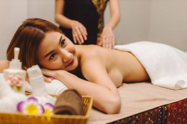 Relaxing with hand massage at beauty spa. Soothing massage, hand of professional massage therapist. Mental health.	