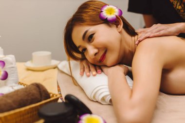 Relaxing with hand massage at beauty spa. Soothing massage, hand of professional massage therapist. Mental health.	