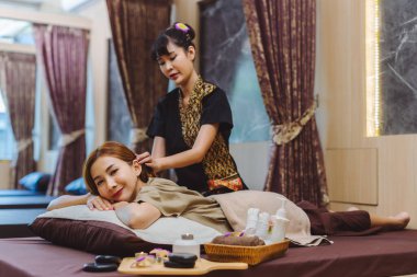 Relaxing with hand massage at beauty spa. Soothing massage, hand of professional massage therapist. Mental health.	