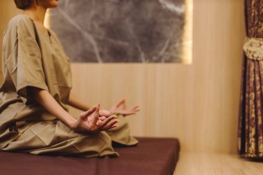 Relaxing with hand massage at beauty spa. Soothing massage, hand of professional massage therapist. Mental health.	