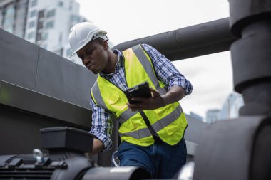 Industrial engineer work on site. engineer visit and inspection site engineer at industrial site. Inspector engineer check and working on site