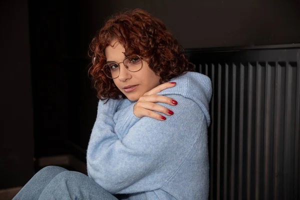 Girl Blue Thick Sweater Sits Radiator Poorly Working Central Heating — Stock Photo, Image
