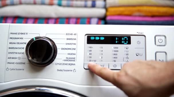 Man Presses Palace Button Pictogram Thermometer Set Appropriate Laundry Temperature — Video