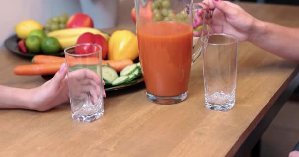 Womans Hand Holding Jug Juice Freshly Squeezed Fruit Juice Friends — Vídeos de Stock