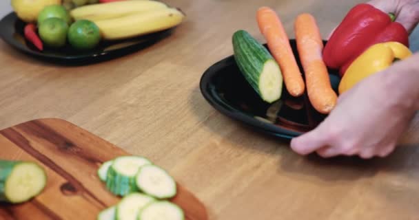 Preparing Healthy Meal Consisting Vegetables Fruits Home Elegant Black Plates — Vídeos de Stock