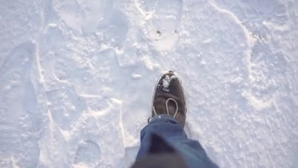 Aerial View Feet Person Moves Forward Person Steps Snow Walking — Stockvideo