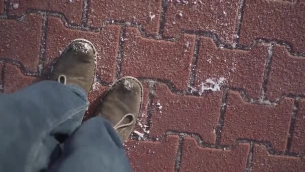 Person Stamps His Feet One Place Person Shakes Remnants Snow — Video Stock