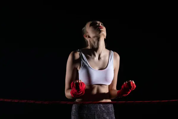 stock image She is an athlete after winning the fight in sports competitions. A fight won by a professional sports player. Strong woman.