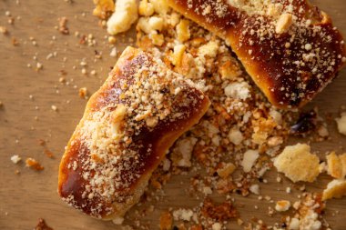 A captivating and enticing closeup image of crumbled pastries, ideal for various food and baking themes