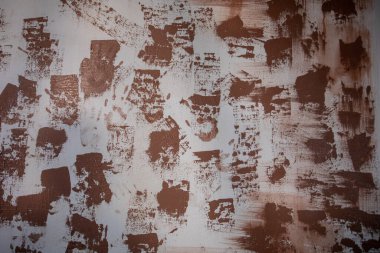 Eşsiz ve büyüleyici bir soyut doku. Gri arkaplana karşı kahverengi desenler sergiliyor.