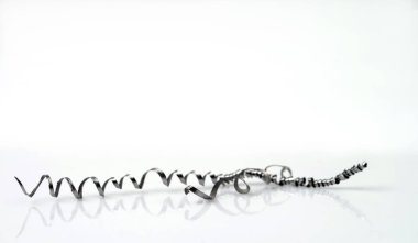 Metal shavings isolated on white backgroundground. Selective focus.  