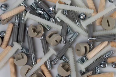 Background of various screws, fasteners and other accessories for assembling furniture. 
