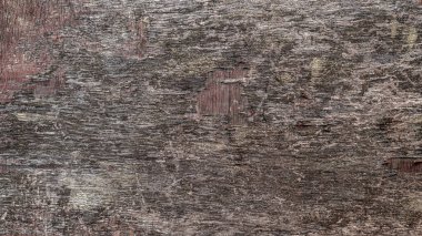 Panoramik formatta boya izleri olan eski kontrplak yüzeyinin dokusu.