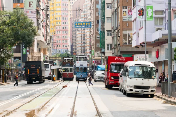 stock image Hong Kong,March 25,2019:Strolling among the skyscrapers through the streets of Hong Kong during a cloudy day