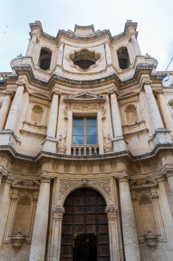 Noto,Italy-May 7, 2022:View of the Ducezio palace from from the top of the stairway of the Cathedral during a sunny day