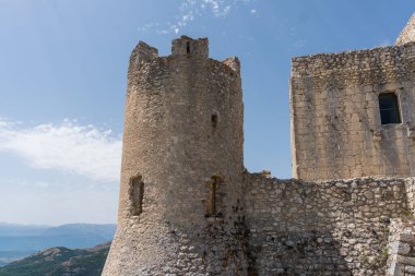 Calascio, Italy-august 9, 2021:particular of the ruins of Rocca Calascio during a sunny day