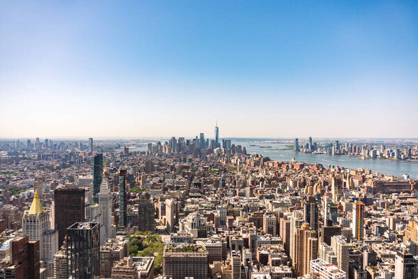 New York City, USA - August 9, 2019:The famous view of Manhattan from the observation deck of the Empire State Building on a sunny day