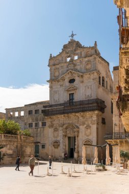 Syracuse, Italy-May 9, 2022:View of the Church of Santa Lucia alla Badia in the cathedral square during a sunny day