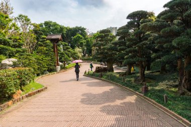Hong Kong, 27 Mart 2019: Bulutlu bir günde Nan Lian Garden manzarası