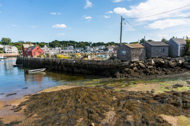 Rockport, USA - August 11, 2019:Rockport town houses near the harbor during a sunny day clipart