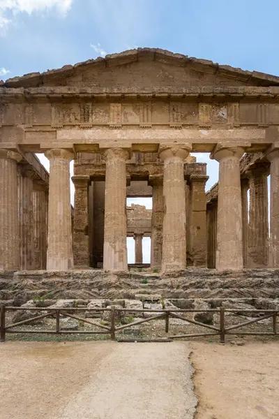 stock image Agrigento, Italy-May 10, 2022: The Temple of Concordia inside the valley of the temples, an archaeological park near Agrigento during a sunny day