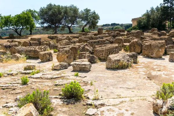 stock image Agrigento, Italy-May 10, 2022:view of the Sanctuary of the Chthonic Divinities inside the valley of the temples, an archaeological park near Agrigento during a sunny day