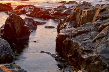 Portekiz 'deki Leca da Palmeira plajında gün batımı