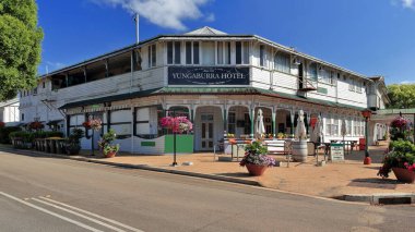 Yungaburra, Australia-October 9, 2018: The AD 1910, timber-built Yungaburra Hotel is a fine example of the Federation architectural style that was prevalent from around 1890 to 1915. Queensland. clipart