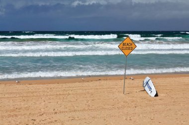The World Surfing Reserve-ranked Manly Beach, one of Australia's most famous beaches -closed due to bad sea conditions- curves two kilometres from South Steyne to N.Steyne and Queenscliff. Sydney-NSW.