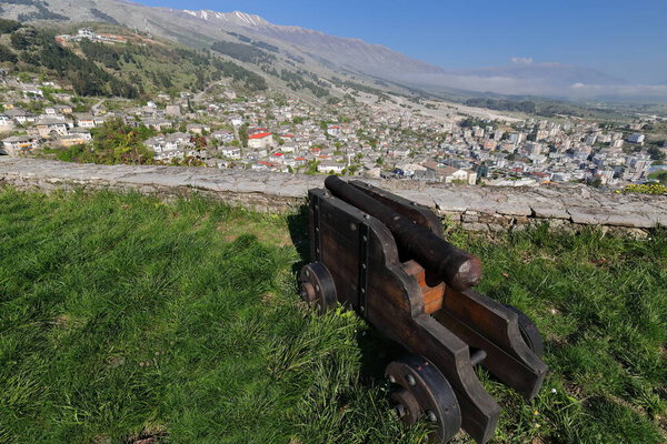 Rusty old, British-made cannon overlooking the town in the valley below, placed by Ali Pasha of Tepelene in the fortress while he was the ruler of the whole region from 1811-1820. Gjirokaster-Albania.
