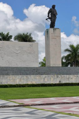 Santa Clara, Cuba-October 14, 2019: A 6'7 m tall bronze statue of Ernesto Che Guevara tops his Mausoleum -Conjunto Escultorico Memorial Comandante Ernesto Che Guevara- inaugurated in December 28, 1988 clipart