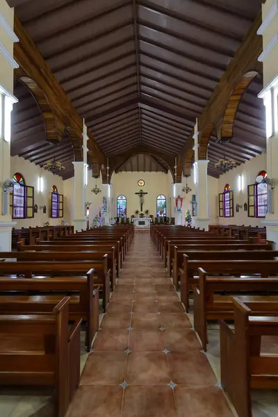 stock image Baracoa, Cuba-October 21, 2019: The Concatedral Nuestra Senora Asuncion-Our Lady Assumption Co-Cathedral from AD 1807 renewed in 1886 and in 2012, Neoclassical building of three aisles with wood roof.