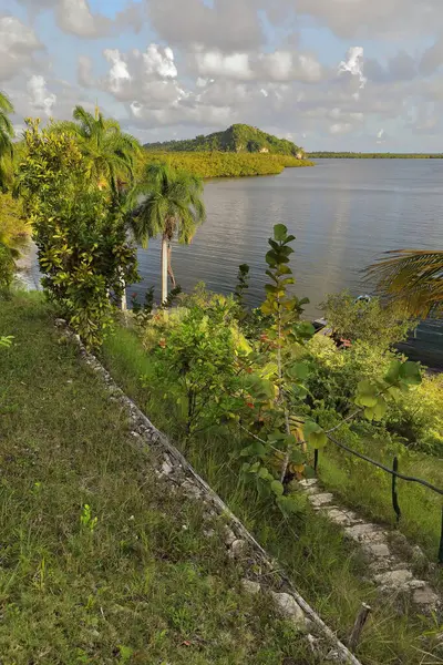 stock image NW-ward view from the visitor centre to the bag-shaped Bahia Taco Bay in the UNESCO World Heritage Parque Alejandro Humboldt Park, in turn inside the Cuchillas del Toa Biosphere Reserve. Baracoa-Cuba.